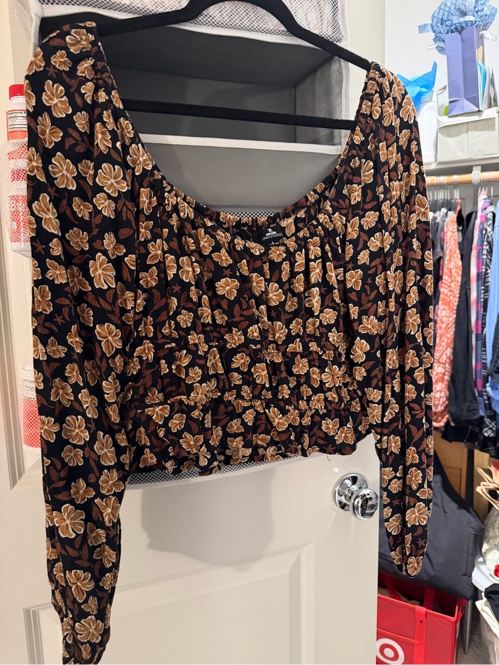 Rip Curl Black Cropped Long-Sleeve Top with Tan Floral Print